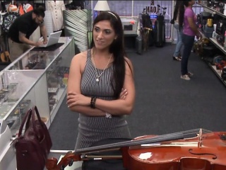 Latina woman pawns a Cello and pounded to earn extra money