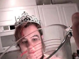 Naked sex slave pissing in a bowl in close-up