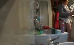 Hidden Cam Shows A Tubby Granny Removing Her Panties To Sit
