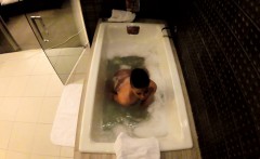 Jezebelle Bond films herself taking a bath