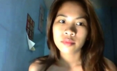 Shaved Phillipine Babe masturbating