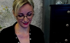 Blonde MILF takes off bra on webcam