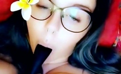 Busty babe playing with her big boobs