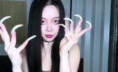 Cute Asian in pretty panties masturbates with a toy