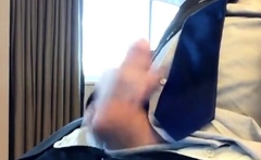 Suited Silver Fox Jerks Off Solo